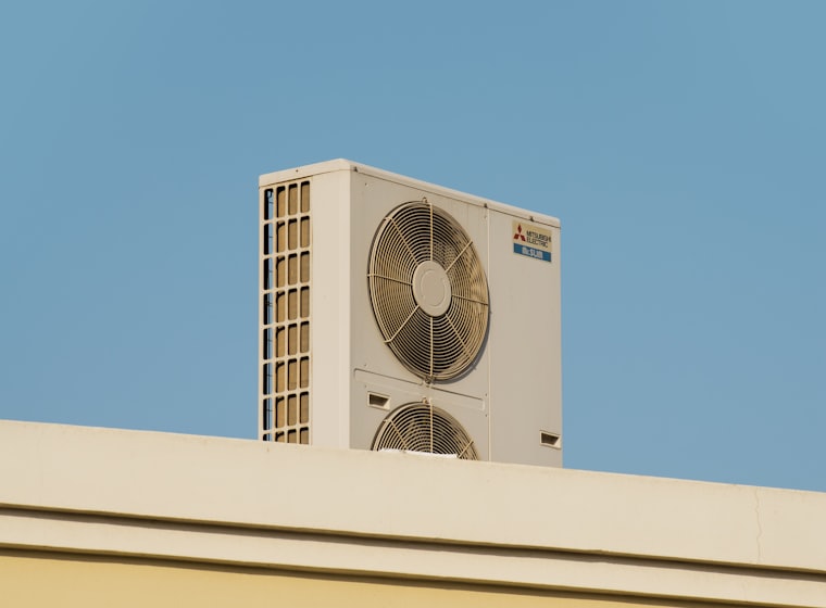 Newly serviced outdoor condenser unit on a Broward County home