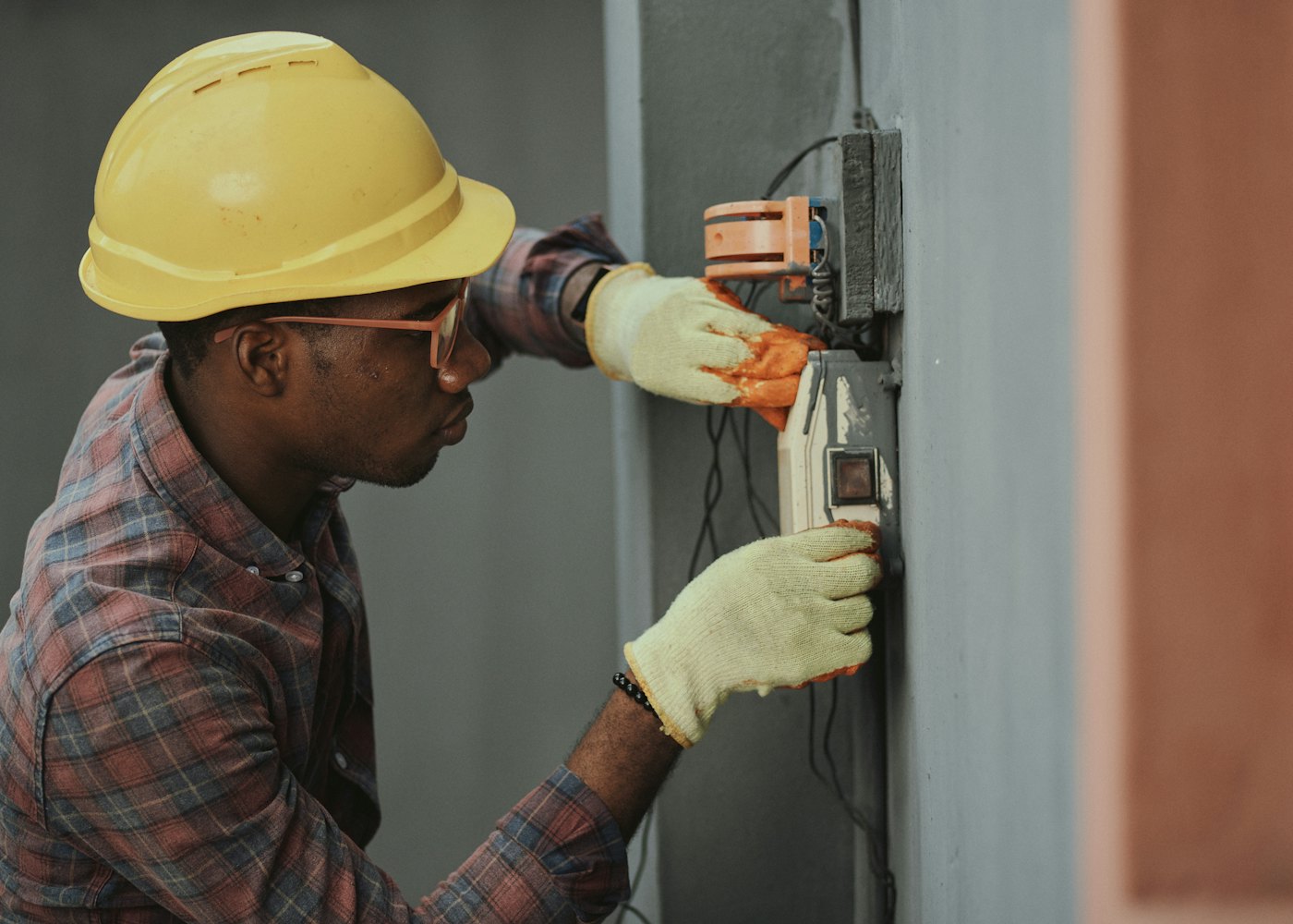 Coastline Air & Heat technician servicing an air conditioning system
